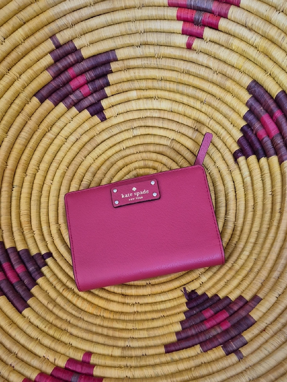 kate spade magenta zip-around leather wallet